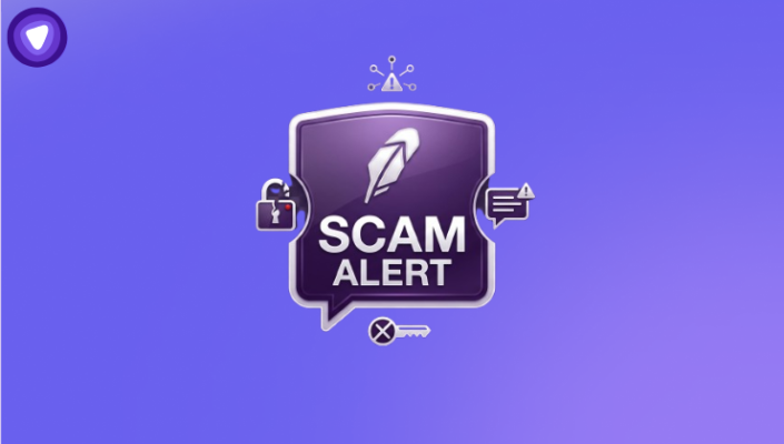 A purple shield graphic with a white Robinhood feather logo and the words "SCAM ALERT" surrounded by small security icons.